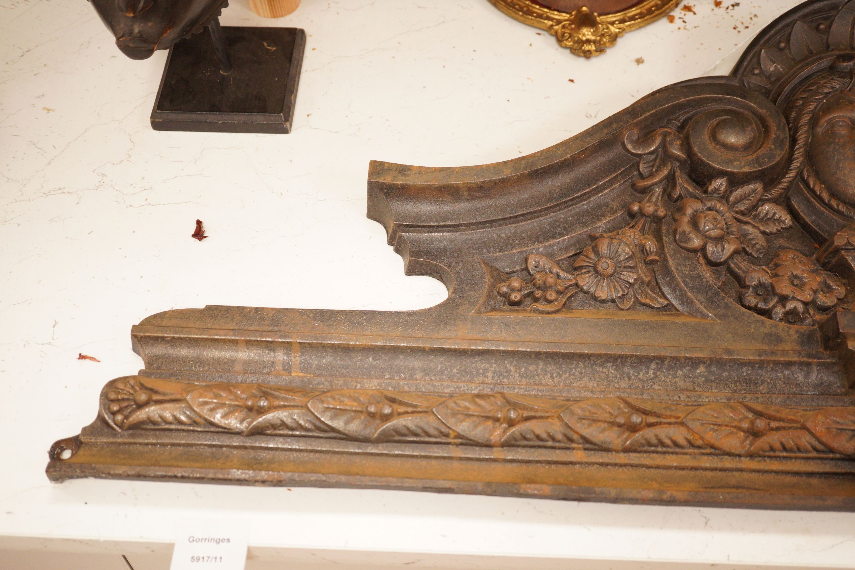 A wall mounted cast iron architectural pediment, 101cm